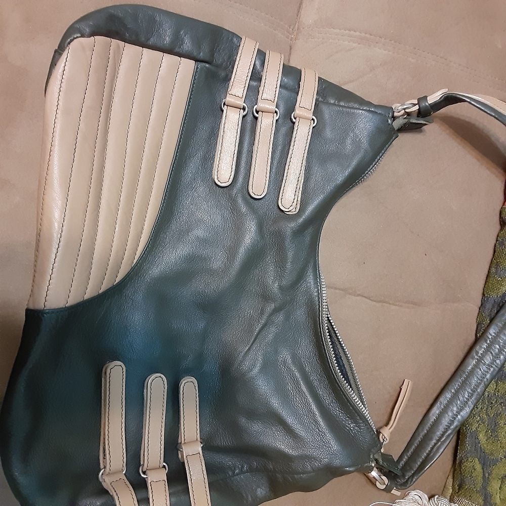 Green and tan leather purse